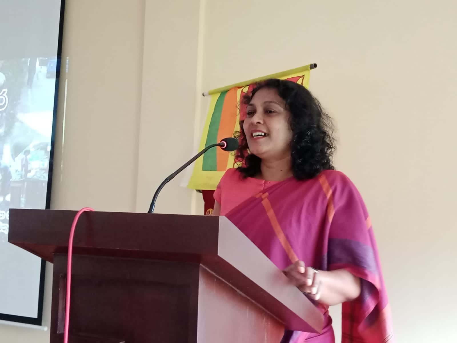 Five cats looking around a field.